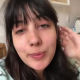 From under the toilet, a very cute girl shits with a hang and drop, then a look at the product. Filmed from a between the legs perspective. Vertical format video. Under a minute.